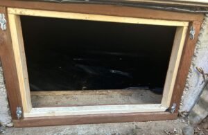 Crawlspace door for long term rodent control