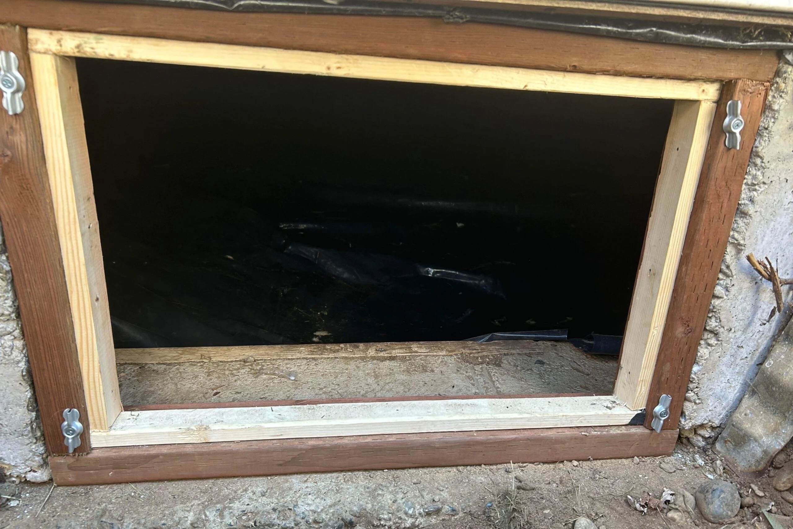 Crawlspace door for long term rodent control